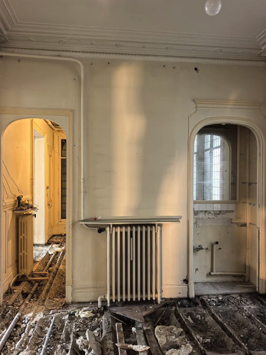 What a Century-Old Apartment Near the Arc de Triomphe Looks Like Once You Open It Up